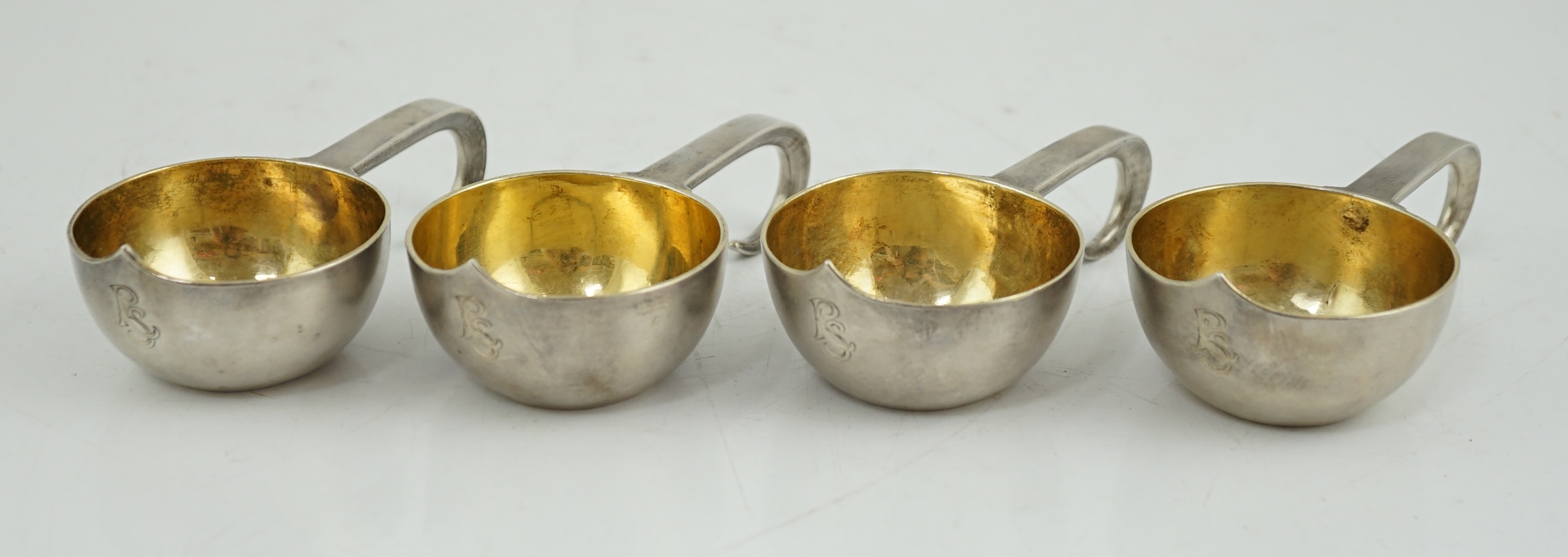 A set of four late 19th century Russian 84 zolotnik silver kovsh cups